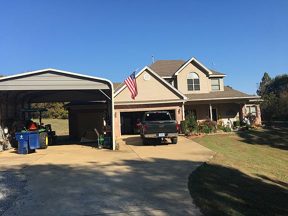 3 car garage with additiona 