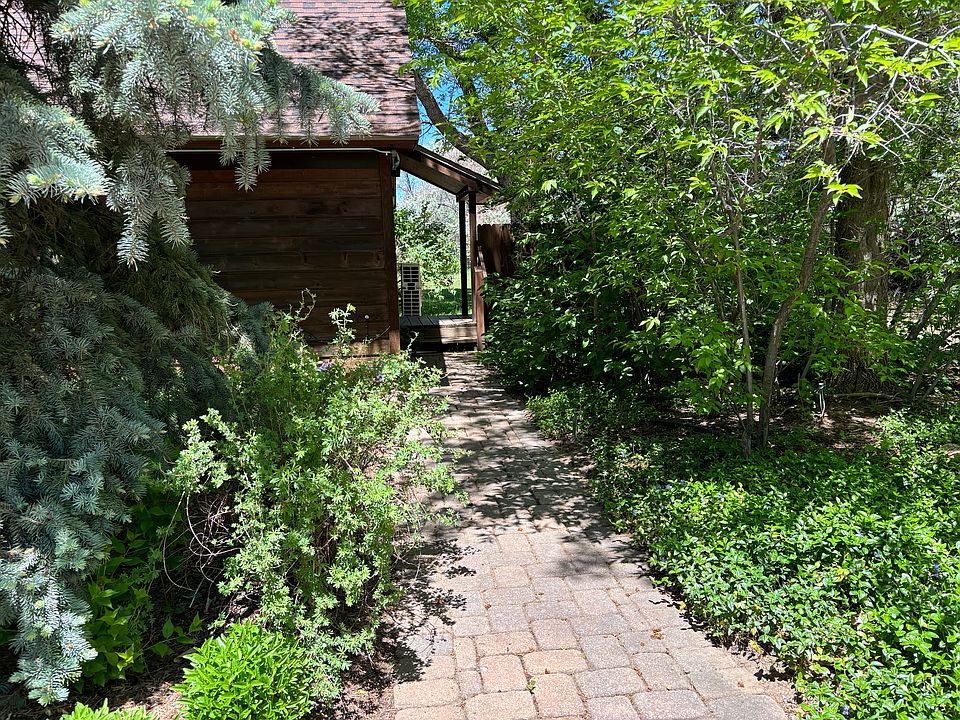 Walkway gardens maintained by owner. Attached garage & lots of visitor parking.