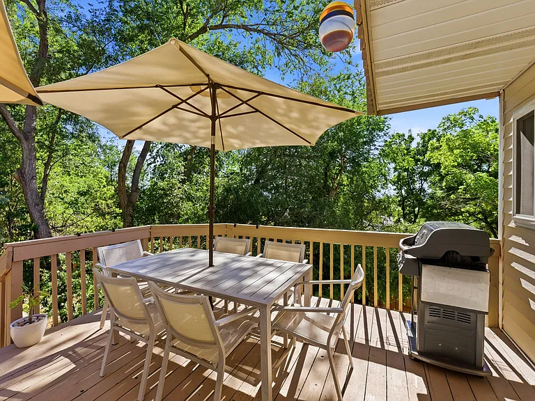 Inviting deck with direct access to the backyard and outdoor living space.