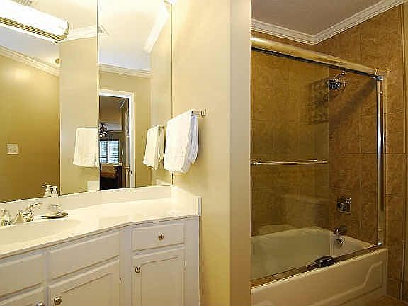 Master bathroom with new tile. Custom built in in the master closet.