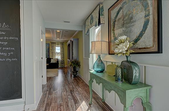 Foyer includes a valet area and coat closet