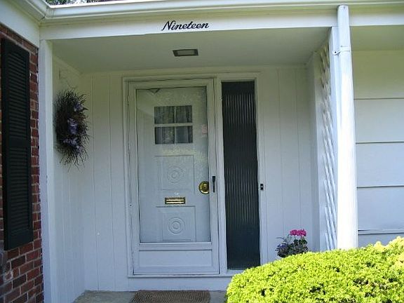 Lovely covered entrance greets you..