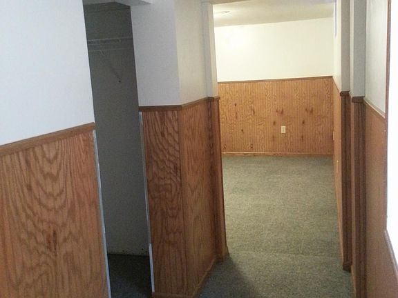 Hallway to one of the bedrooms