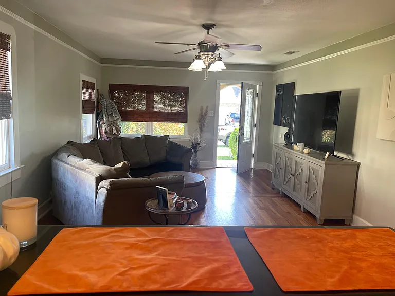 Kitchen looking into huge living area. Great natural light floods this home!