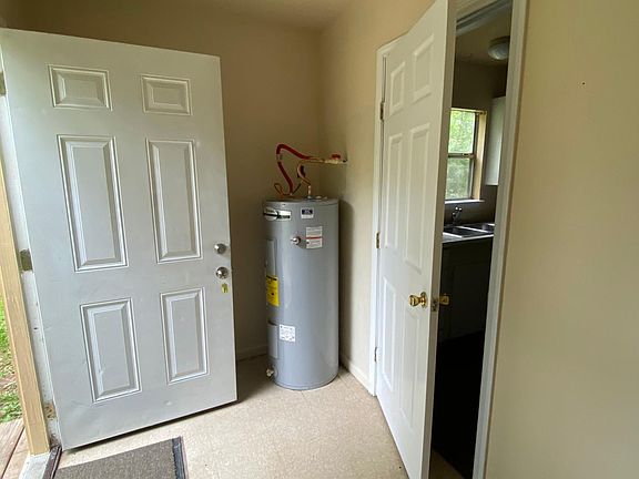Front entry to laundry / mud room.