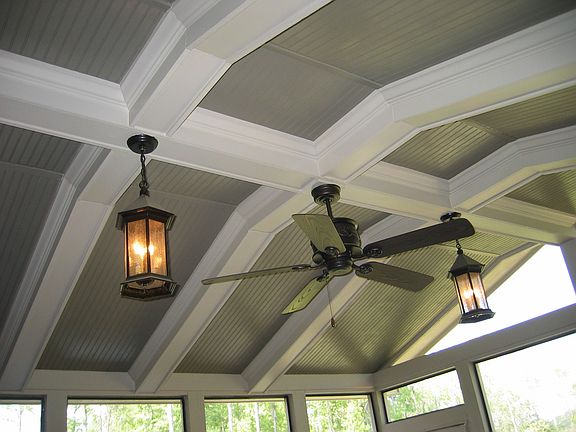 Coffered ceilings in screen porch overlooks 50 acres of green space!