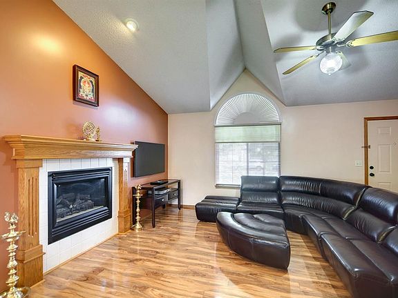 Vaulted Ceilings, Gas fireplace, beautiful flooring