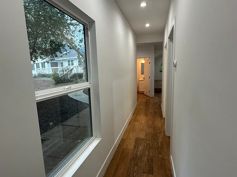 Hall to bedrooms and full bathroom