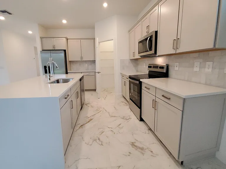 1949 NE Ocean Dunes Dr — Photo 18