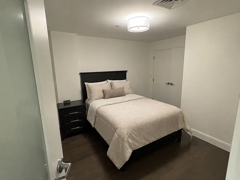 Bedroom (AI example with fake sheets)