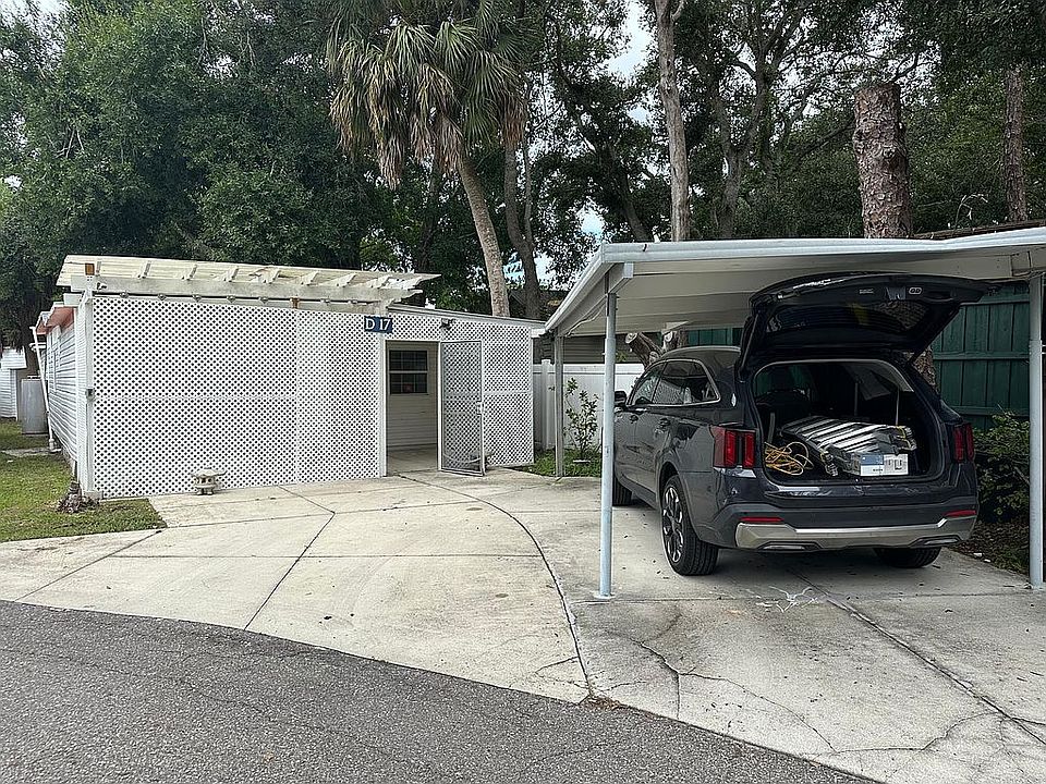 FRONT AND CARPORT