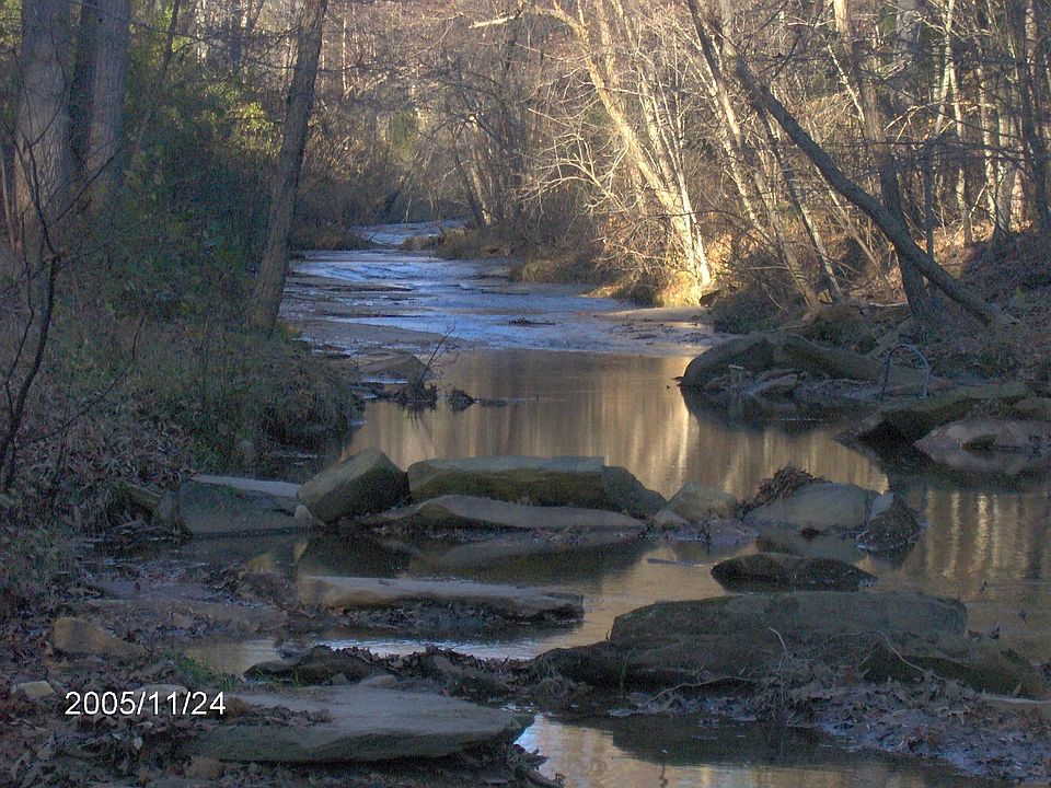 Creek behind house on 14 +/- acres