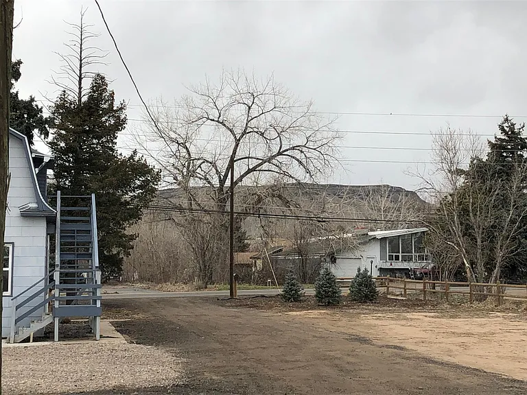 View of driveway with sights of North Table Mountain.