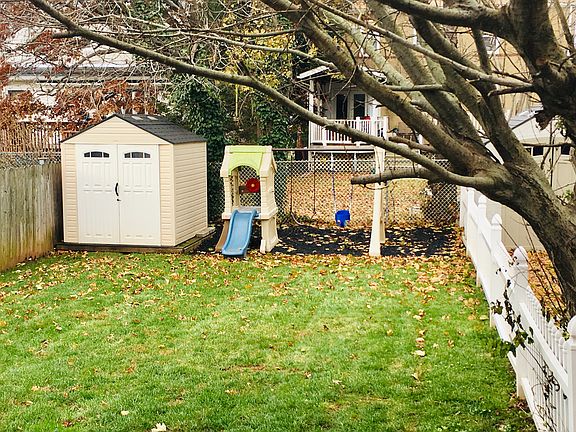 Fenced yard with shed