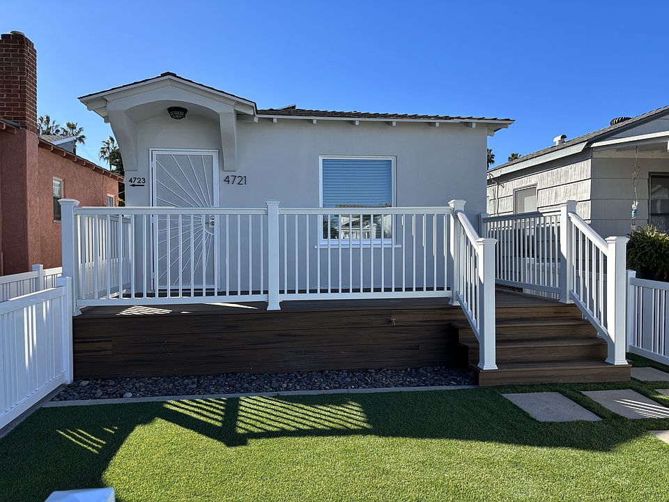 View of front of home, with private yard and deck