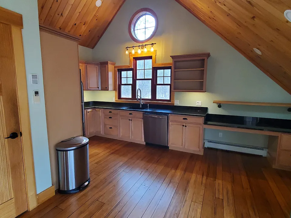View as from entrance. Living area including kitchen.
