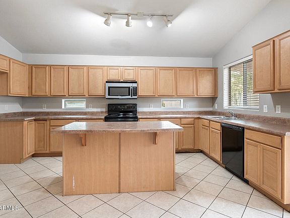 4th image of 24118 W DESERT BLOOM Street
