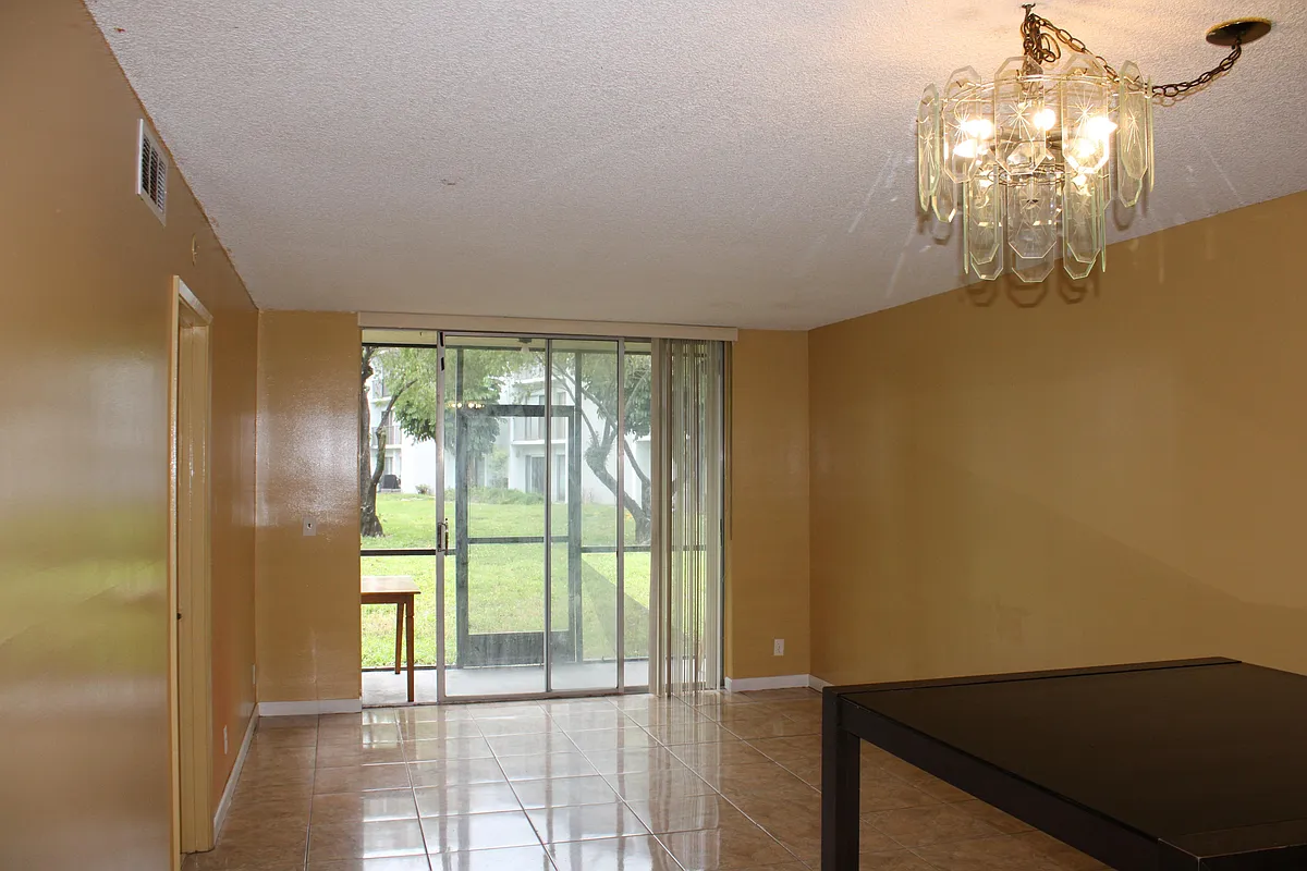 Building Photo - 8730 N Sherman Cir #107