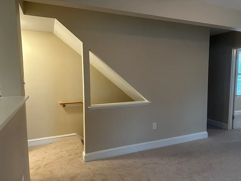 stairs into main area of apartment