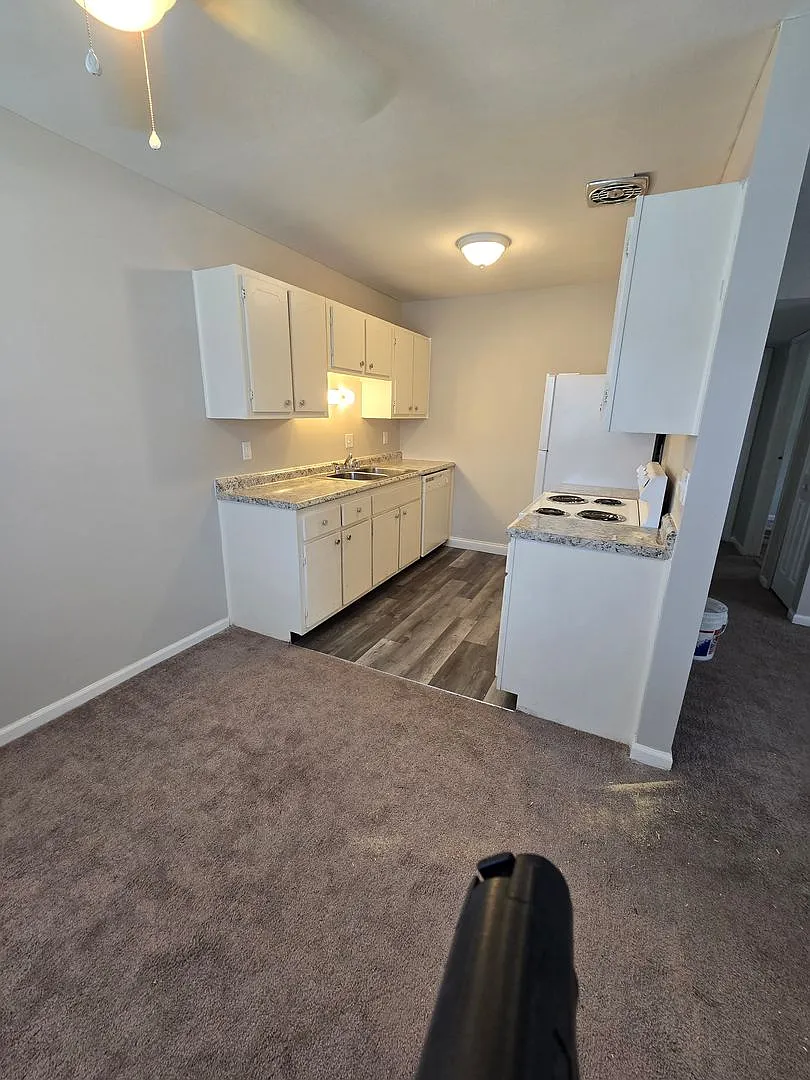 3237 Town and Country Apartments — Photo 1