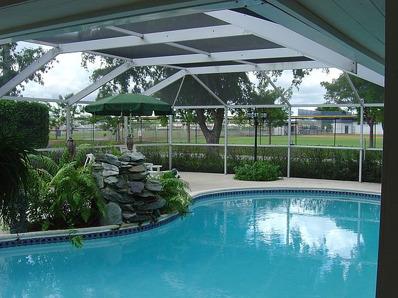 The screened pool deck measures app. 1600 sf