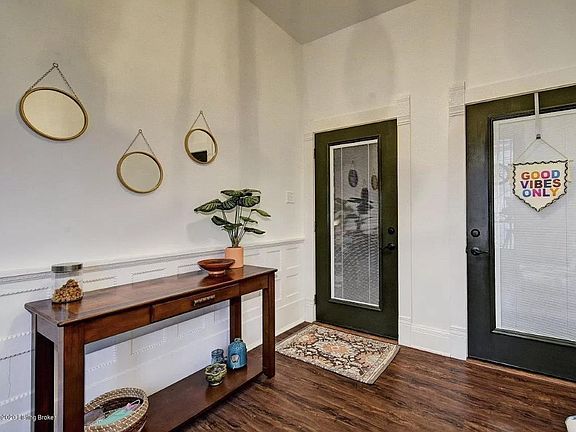 Apartment door (on left)