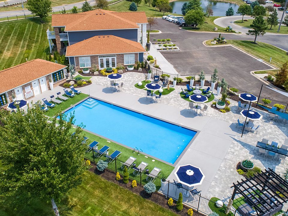 Immerse yourself in the luxurious resort-style pool and sprawling sundeck, a captivating oasis for residents to unwind and relish moments of leisure.