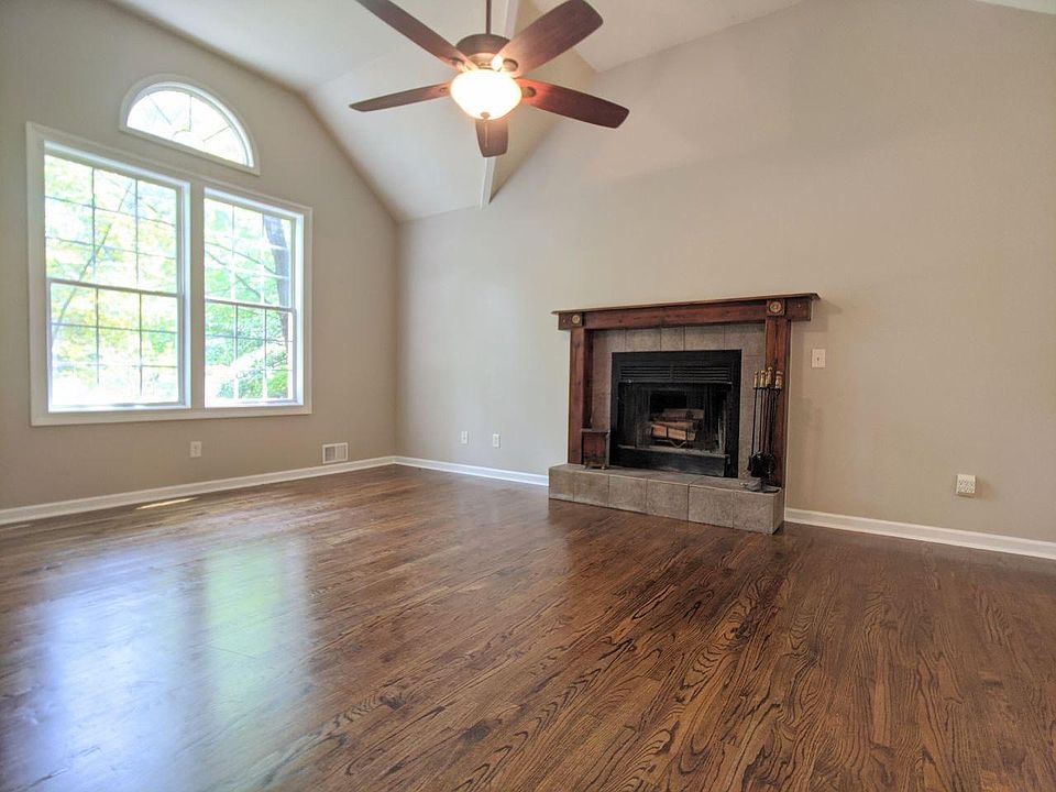 Living Room with vaulted ceiling and fireplace