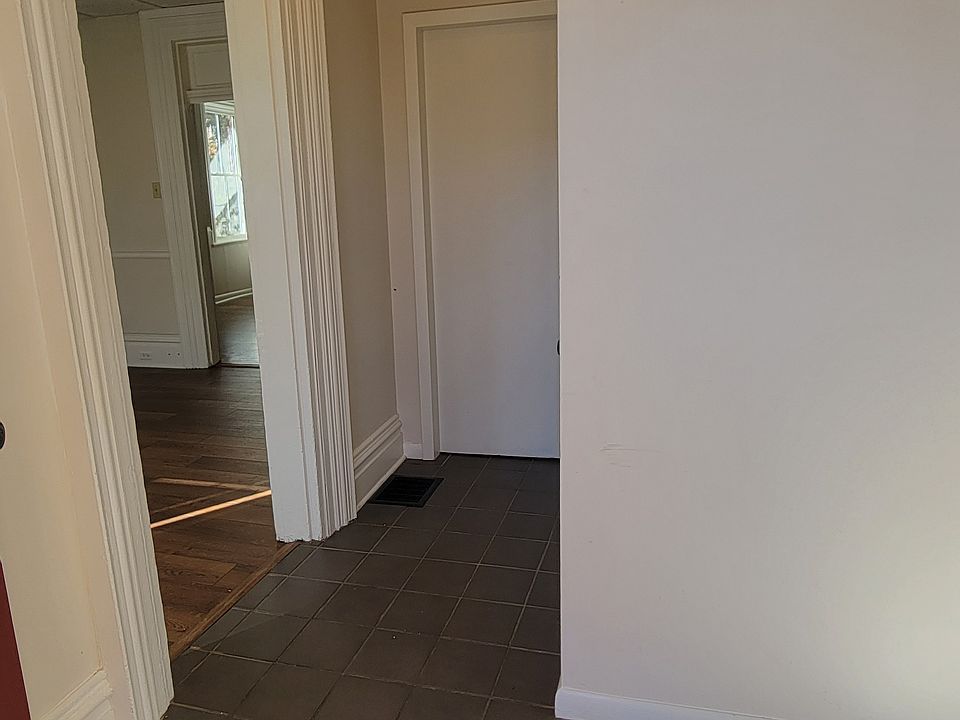 Entryway, which comes with a closet is between the bedroom and living/kitchen space