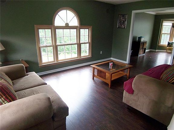 Newer hardwood flooring in living room and dining room.