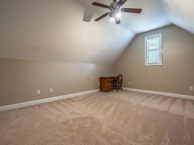 Bonus room, bathroom has been added since this photo.