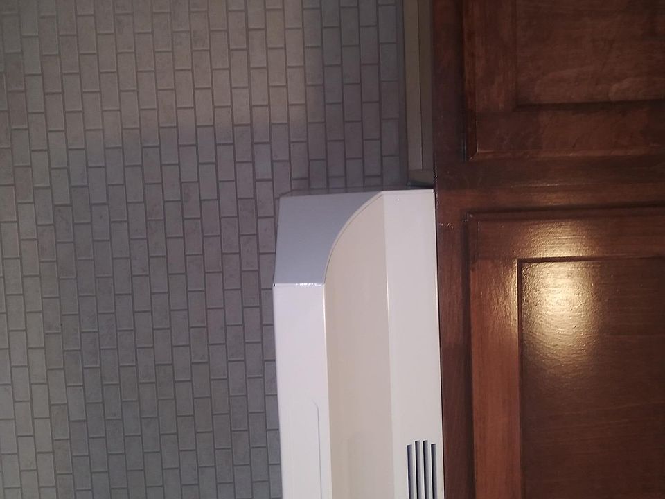 Newly installed kitchen. Cabinets, sink countertop, etc. First to use the stove.