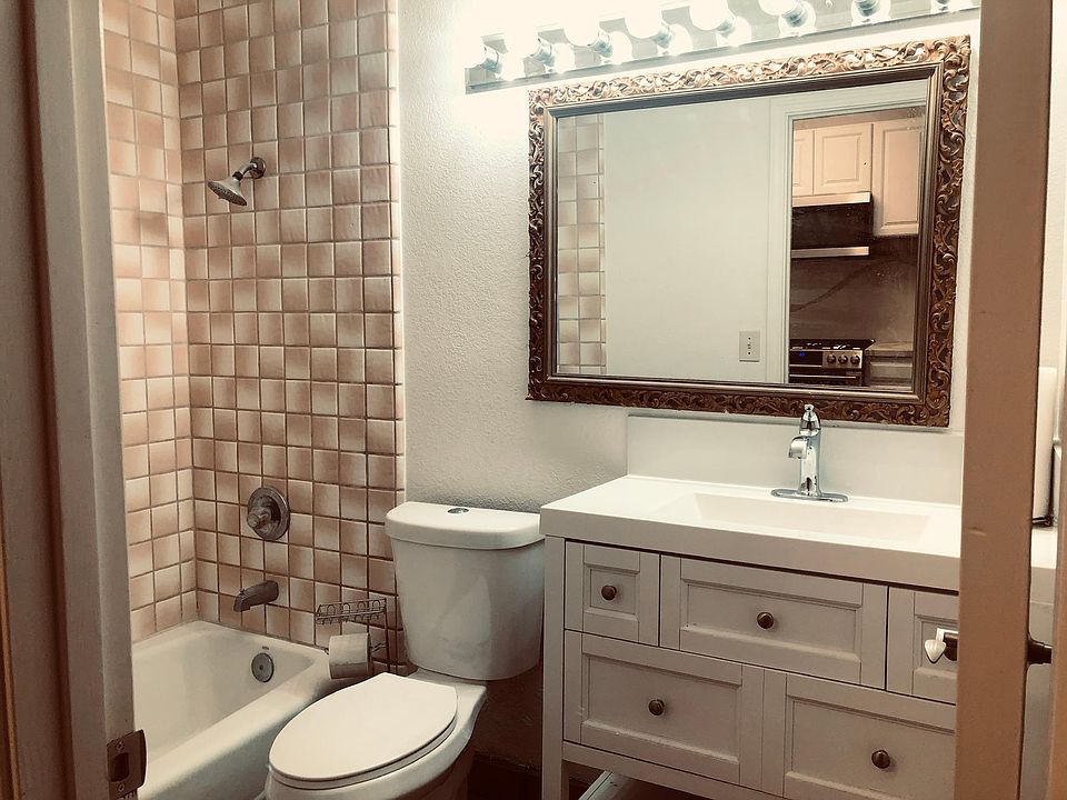 New bathroom cabinet and toilet.