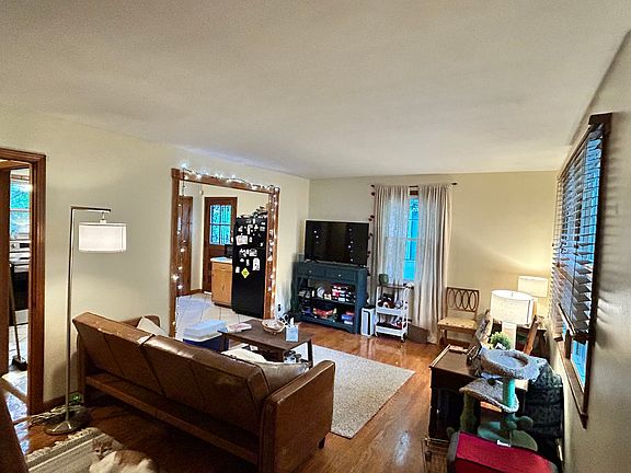 Living room on the main floor which opens to the kitchen