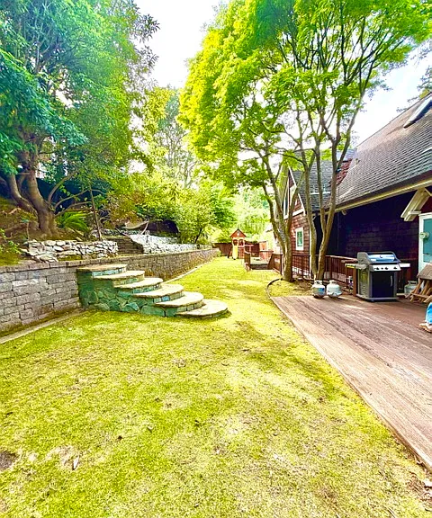 Large backyard, great for kids, with wrap around deck for BBQs etc.