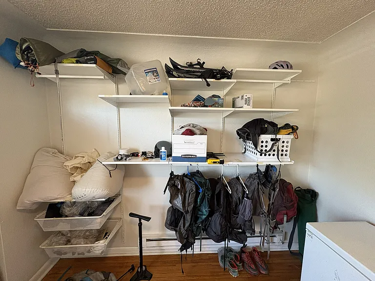 Main floor bedroom built in wall storage