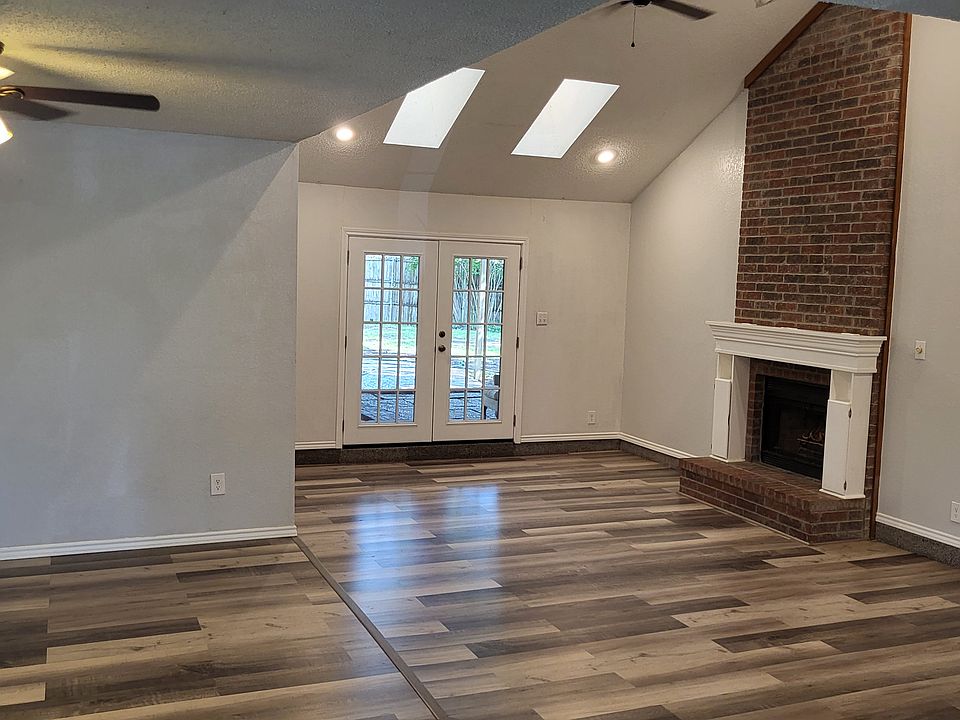 Living room and dining room seen from entry foyer.