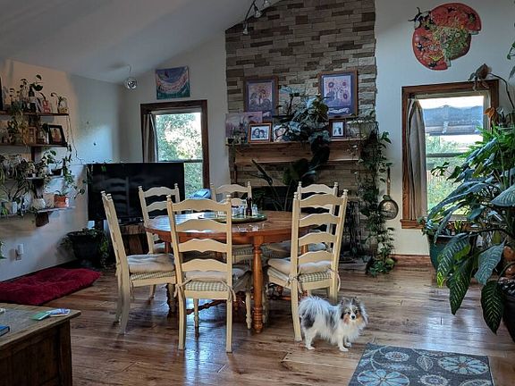 Shared Great Room on main level with Billie the resident dog