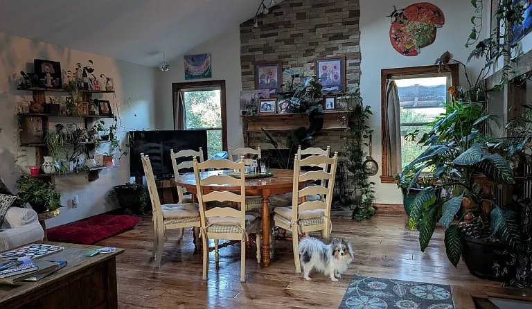 Shared Great Room on main level with Billie the resident dog