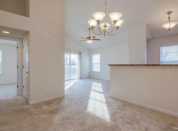 Inviting open floor plan and vaulted ceilings set this unit apar