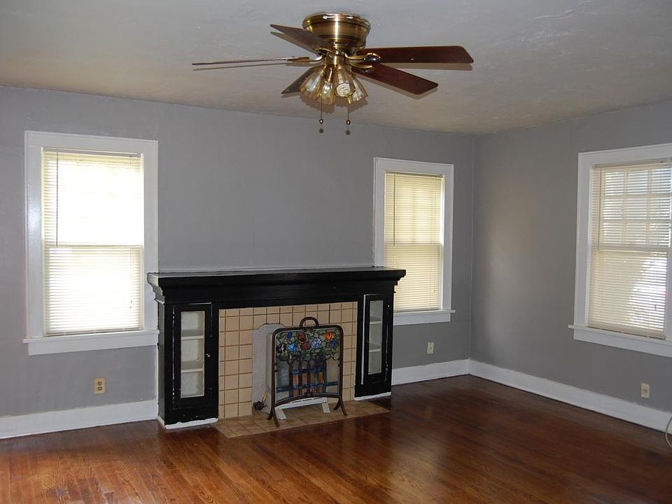 Living area, hardwood floors, fresh paint, good natural ligh