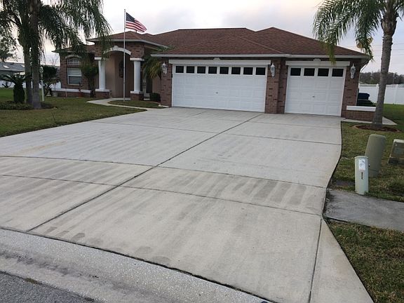 3 Car Garage, long driveway