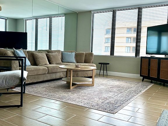 Living Room with 65" TV, cable included