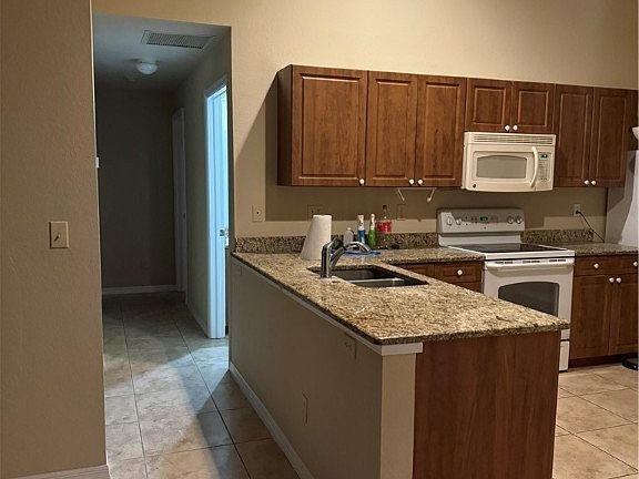 4th image of 2600/2602 Sunniland Blvd