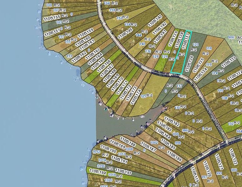 Lot outlined in blue. 