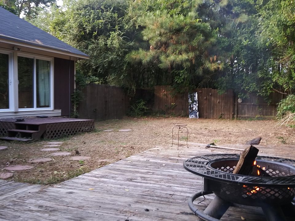 MAIN yard with covere patio 