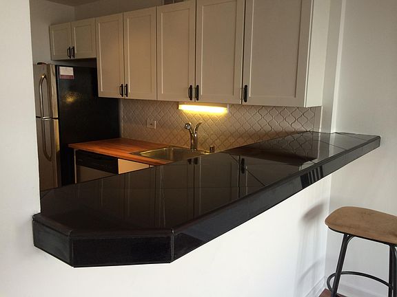 Granite breakfast bar in kitchen