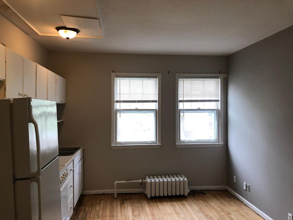 Two windows overlooking yard to the north.