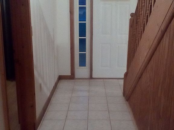 Hall between kitchen &front 