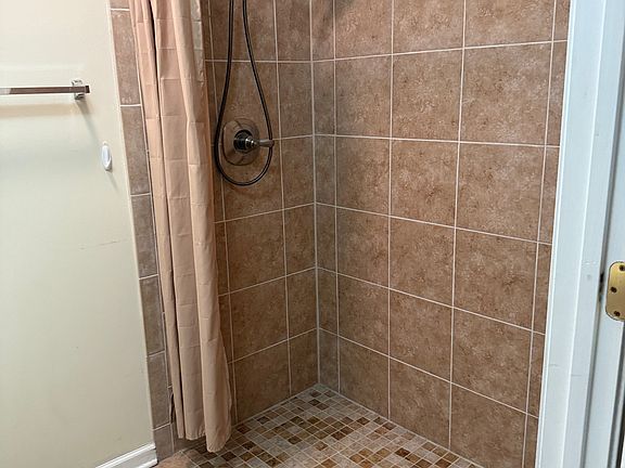 seamless shower lip for roll in